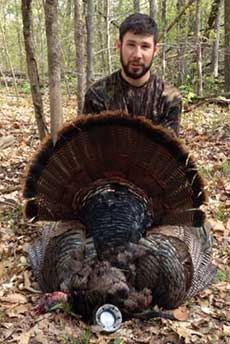 Zach Hart with turkey - Southern Ohio Outfitters
